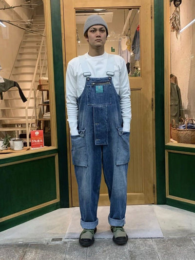 Salopette multi-poches à bretelles en denim vieilli