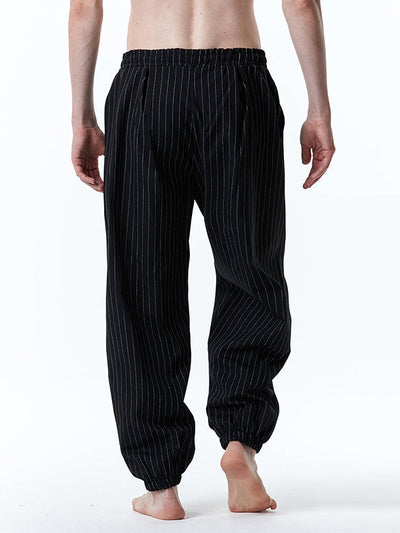 Pantalones de rayas sueltas casuales con cordón para hombres