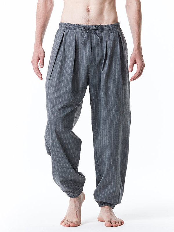 Pantalones de rayas sueltas casuales con cordón para hombres