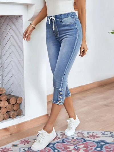 Capri en denim extensible avec cordon de serrage et taille élastique et fente boutonnée