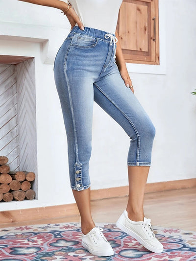 Capri en denim extensible avec cordon de serrage et taille élastique et fente boutonnée