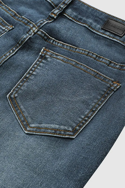Jean bootcut taille moyenne avec broderie florale à la main