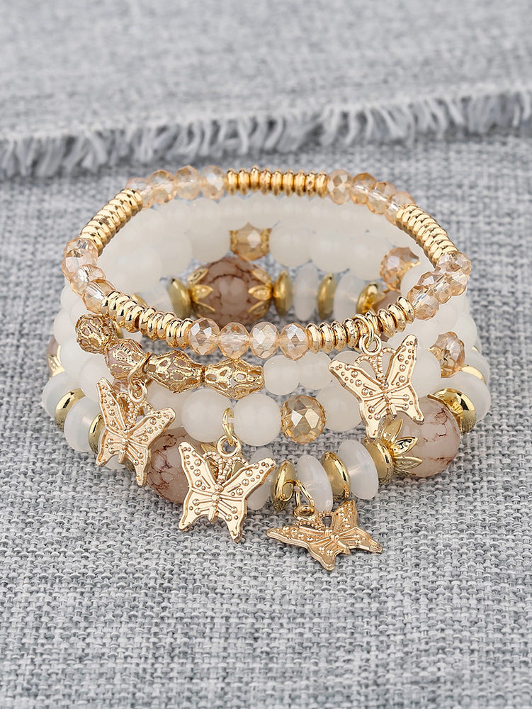 Pulsera Bohemia con Colgante de Mariposa de Cristal Multicapa
