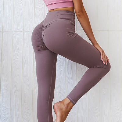 Pantalones de yoga para levantamiento de glúteos color melocotón