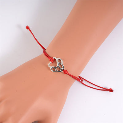 Bracelet ajustable tressé en forme de patte de chien