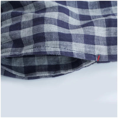 Robe mi-longue à carreaux et col roulé en coton