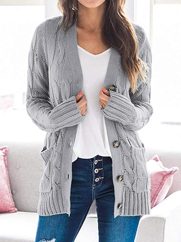 Cardigan en tricot avec poches boutonnées sur le devant