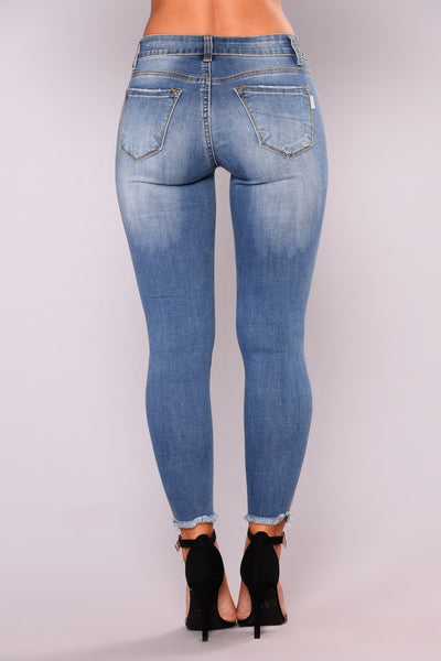 Jeans tobilleros de denim elástico