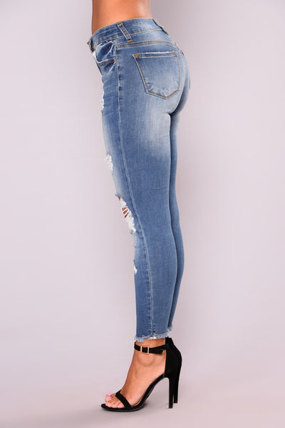 Jean en denim extensible rehaussant la cheville
