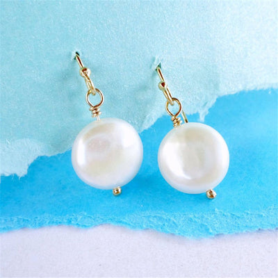 Boucle d'oreille en perles baroques
