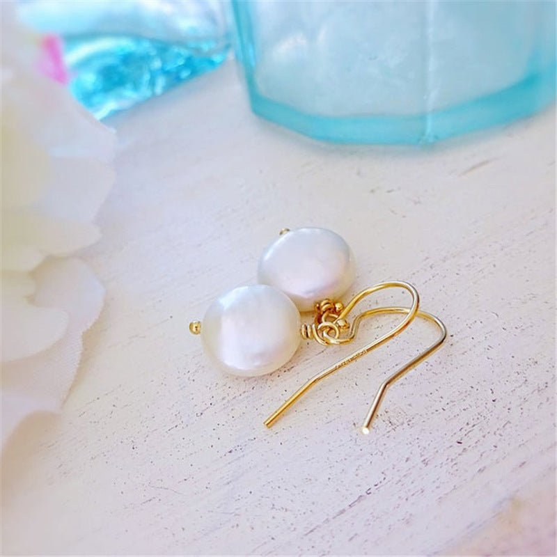 Boucle d'oreille en perles baroques
