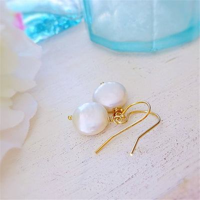 Boucle d'oreille en perles baroques