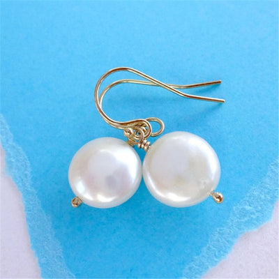 Boucle d'oreille en perles baroques