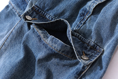 Salopette multi-poches à bretelles en denim vieilli